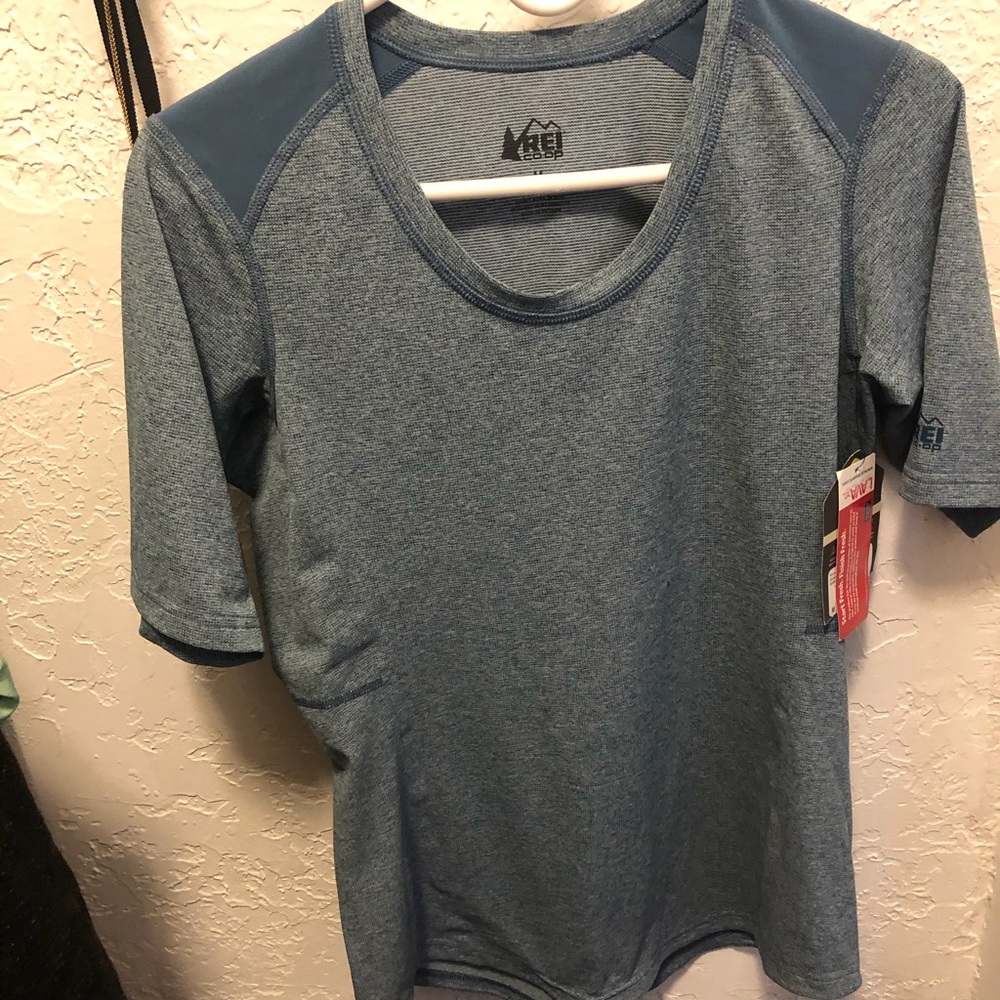 REI blue hiking shirt